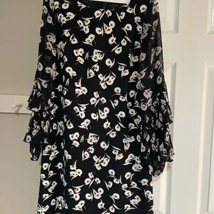 Chic Black Dress with White Floral Design